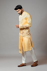 Mustard Nehru jacket Mustard Assymetric double panel kurta with embroidered sleeve and pant pajama set