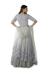 Light Green Floral Embroidered Blouse with an Asymmetrically Layered Lehenga paired with a Dupatta