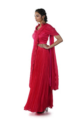 Tomato Red Embroidered Blouse with an attached Palla paired with a Pleated Skirt