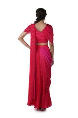 Tomato Red Embroidered Blouse with an attached Palla paired with a Pleated Skirt