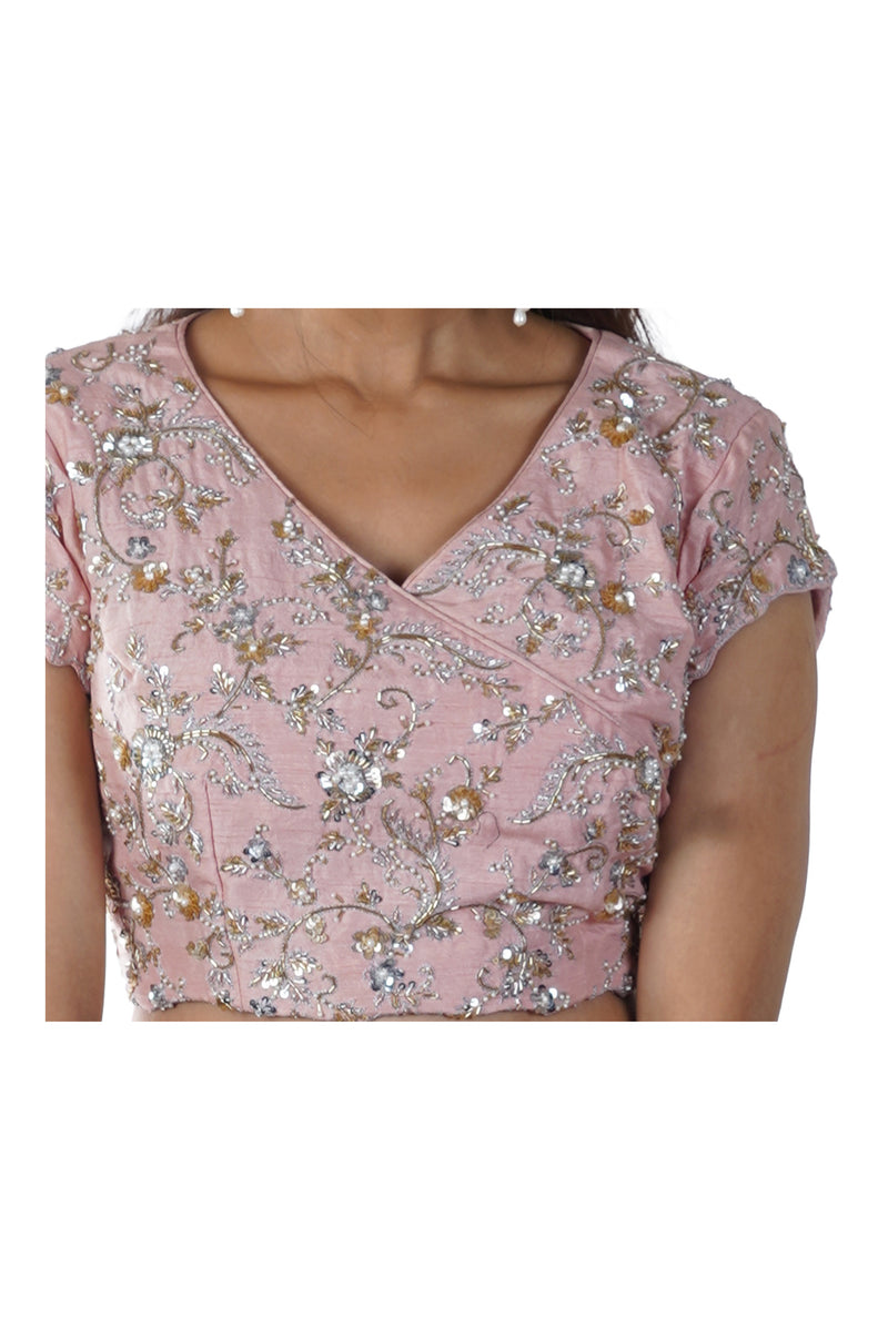 Pink Hand Embroidered Overlapped Style Bow-Tie Blouse paired with a Layered Lehenga