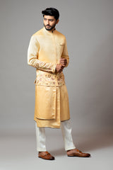 Mustard Nehru jacket Mustard Assymetric double panel kurta with embroidered sleeve and pant pajama set
