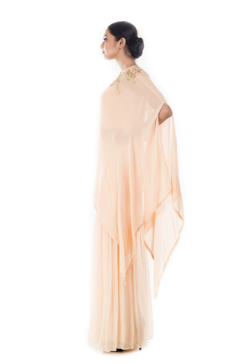 Creamsicle Jumpsuit Paired With A Cape