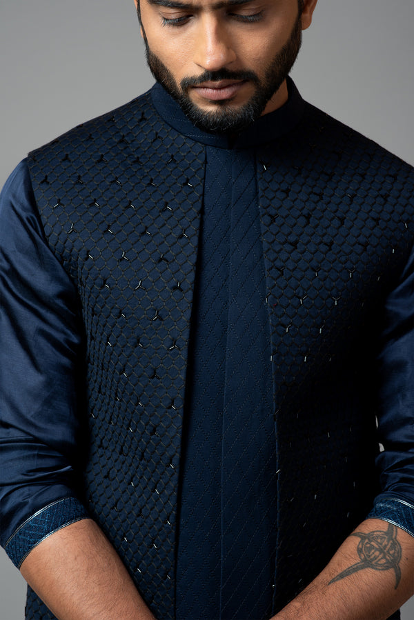 Navy blue Nehru jacket with Honeycomb pattern embroidery highlighted with panel detailing.