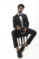 Black Trail Tuxedo, Paired with a V- Neck Waistcoat and Narrow Fitted Black Trousers.