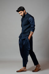 Navy blue Nehru jacket with Honeycomb pattern embroidery highlighted with panel detailing, paired with adrape kurta set